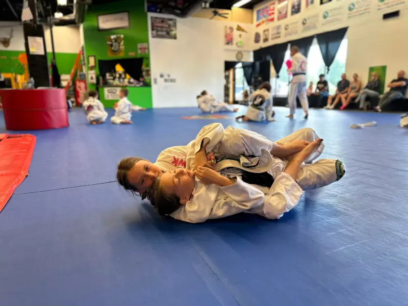 Kids practicing Brazilian Jiu-Jitsu at West Coast Martial Arts